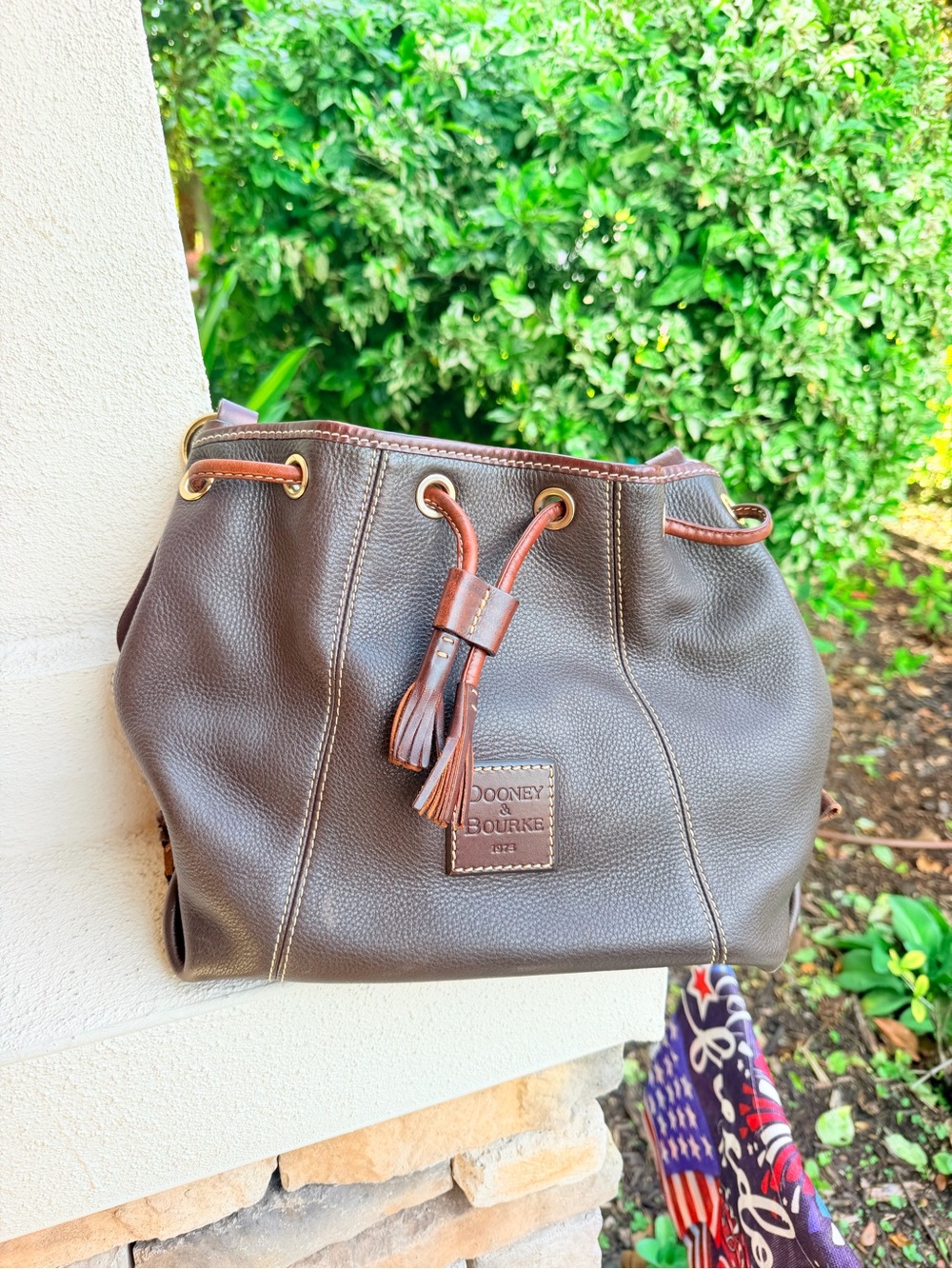 Dooney & Bourke 1975 Brown Pebbled Leather Drawstring Bucket Bag Tassel